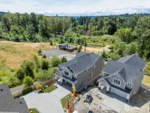Perfectly situated to provide privacy and open space on one side, and a roomy driveway.