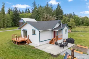 Nestled on 5 acres country charm awaits!