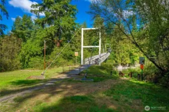 Community Pedestrian Bridge and River Beach Access