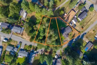 All 3 lots are being sold together. 2 vacant lots and the lot with the house. Lines are approximate.