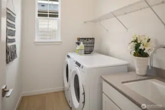 Laundry room. Photo taken from a similar model, may contain upgrades.