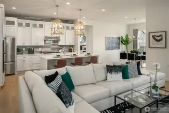 Great room open to kitchen. Photo taken from a similar model, may contain upgrades.
