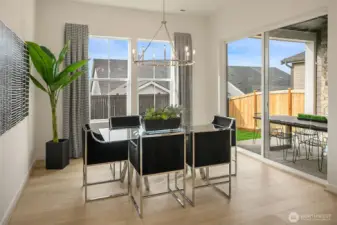 Dining area. Photo taken from a similar model, may contain upgrades.