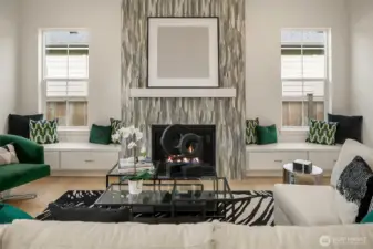 Great room and fireplace. Photo taken from a similar model, may contain upgrades.