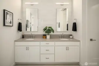 Primary Bathroom with dual vanity. Photo taken from a similar model, may contain upgrades.