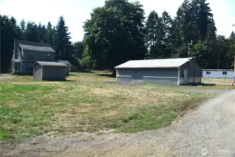 Main house, well house and shop