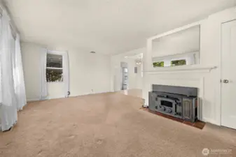 View of living room as you enter from the front door.