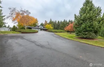 Enter through the gate and feast your eyes on a beautiful property!