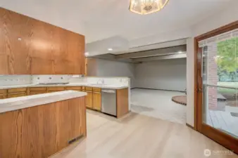 The kitchen also flows into a large, cozy family room with a brick fireplace!