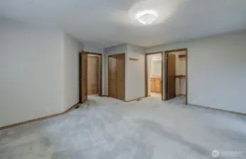 Primary suite offers plenty of space for everything, plus a massive walk-in closet, 2nd closet, covered balcony, and full-size attached bath!