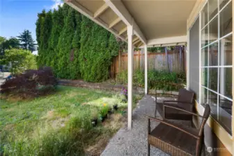 Enjoy the neighborhood under this cozy covered patio all year around!