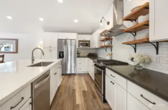 Awsesome remodeled kitchen - no shortage of counter or cabinet space.