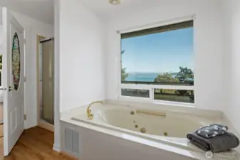 Ensuite bath includes a large soaking tub and separate shower.