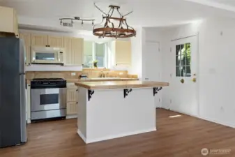 Downstairs includes a separate apartment with it's own private entry. This space is perfect for extended family stays/guest suite or rent it out for extra income.