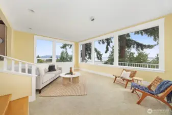 A few steps down from the dining/living room lead to this wonderful front View room.