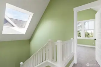 Head upstairs to the two, matching guest rooms on either side.