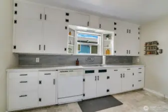 kitchen is spacious and newly refreshed: new Quartz Countertops and freshly painted.