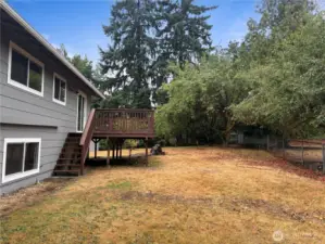 Expansive backyard at 16312 127th Pl SE, Renton—wide, sunny lawn and quiet cul-de-sac setting in the Cascade neighborhood 98058.