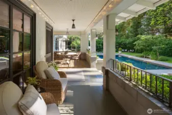 Covered dining offers year round al fresco meals prepared indoors on your chef's fave Bluestar range or stay outside to cook at the outdoor kitchen.