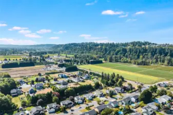 The home is located close to local farms,  which provide peaceful scenery on your drive.