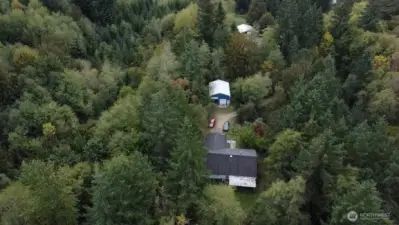 Property view with home and shop