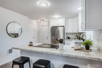 Beautiful quartz countertops provide a modern setting for preparing your favorite dishes!