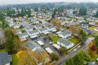 The parking lot has an ideal ratio of reserved, covered parking spots for residents, as well as plenty of visitor parking.