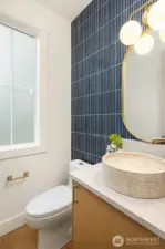 Main floor half bath - perfect for guests