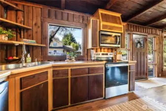 Lots of custom cabinetry in this open concept kitchen