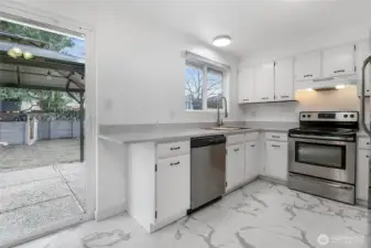 The kitchen is well laid out, with an adjacent eating area too!