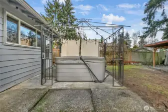 And there's a hot tub adjacent to the covered portion of the patio. This photo was taken underneath the covered area.