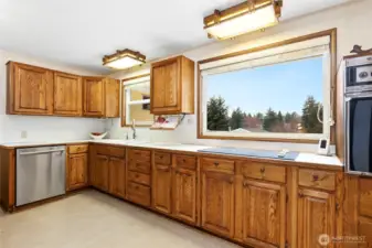 1/2 of enormous kitchen with territorial view!