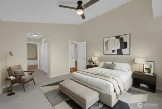 Virtually staged. Spacious primary bedroom offers respite at the end of the day.