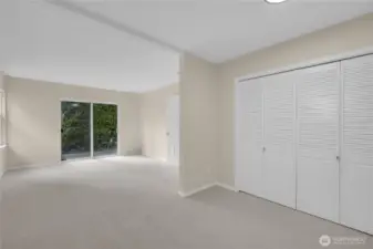 This room is currently used as a bedroom. Thoughtfully arranged into two distinct open zones.