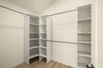 Custom walk-in closet system designed for maximum organization and efficiency.