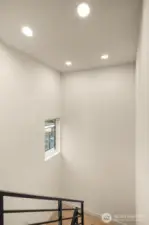 Dedicated laundry area with streamlined storage solutions and modern utility features.