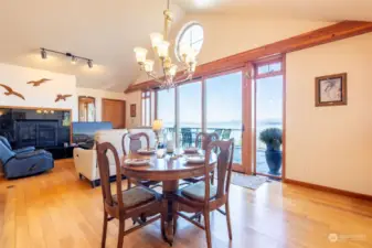 Dining area off of kitchen with view of the bay.