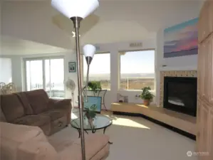 IMMEDIATELY YOU SEE THE OCEAN WAVES FROM THE OPEN CONCEPT LIVING SPACE!