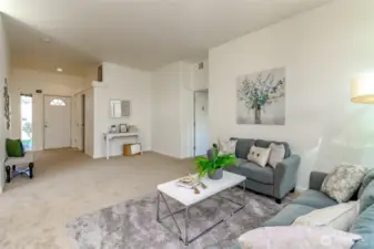 Extra space off living room for piano, book shelves, sitting area, or pet area.