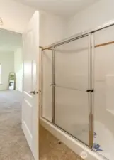 Separate shower off primary on suite.