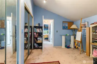 2nd bedroom with sliding doors going to additional seating area.