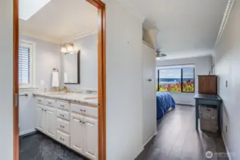 View of the ensuite bath and primary suite on the main level