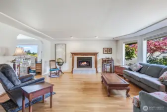 Formal living room space with gas fireplace