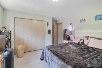 opposite side of home from primary bedroom