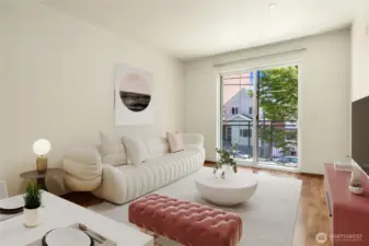 A large living space with walk out to balcony