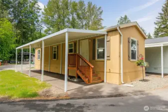 Covered Front Entrance  and Covered Parking area