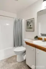 Main bath with door to second bedroom
