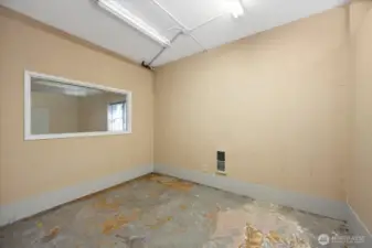 Room with window and heat vent off the great room.