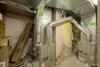 Property has two gas furnaces, one with HVAC (Air conditioning).