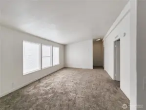 Second living space provides flexibility for a media room, play area or the perfect place for game night with easy flow to the kitchen guest bath and bedrooms.